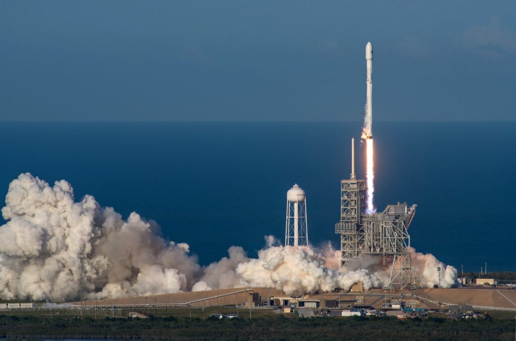 SpaceX Falcon 9 rocket lifting off at launch