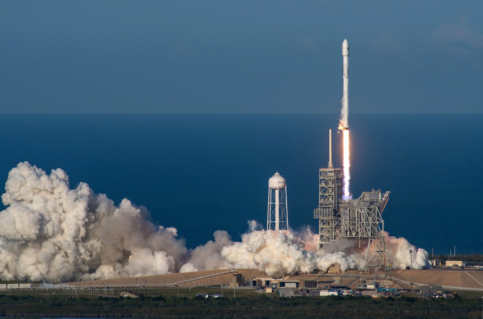 SpaceX Falcon 9 rocket lifting off at launch