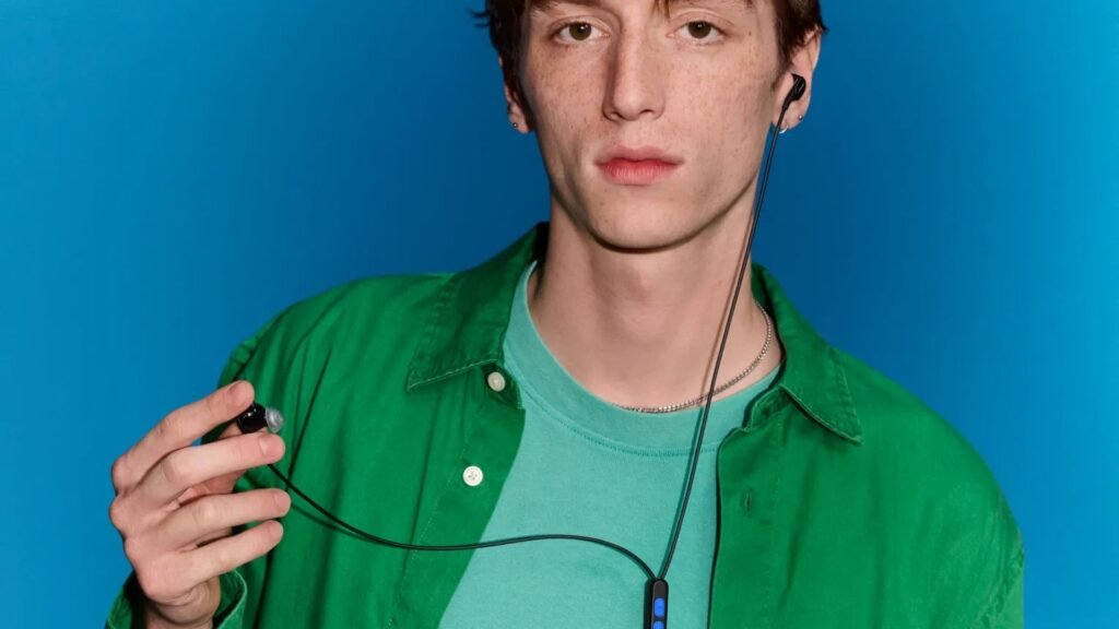 Person wearing the Bose Noise Cancelling Wired Earbuds with in-line remote