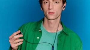 Person wearing the Bose Noise Cancelling Wired Earbuds with in-line remote