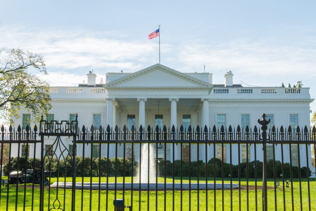 The White House in Washington, DC under a clear blue sky