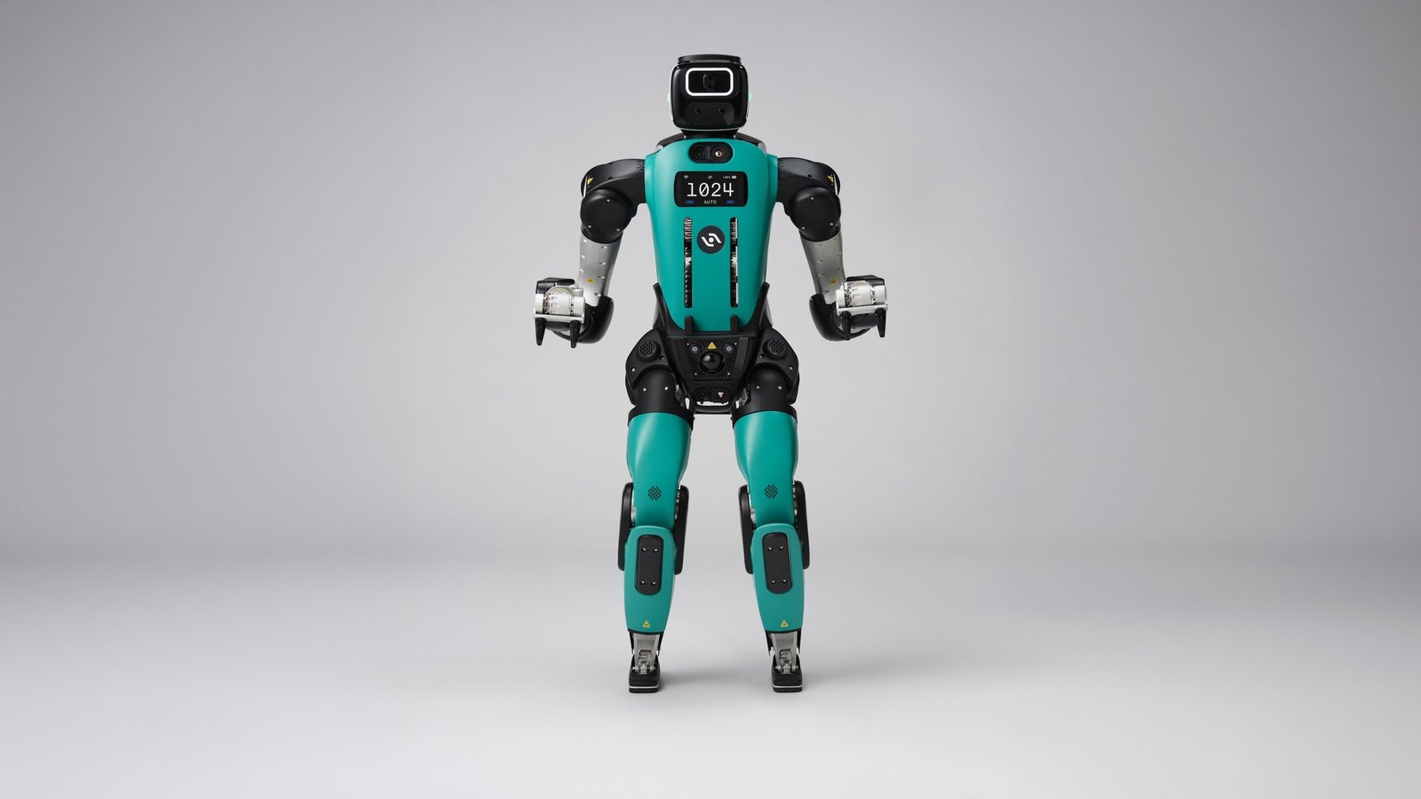 Agility Robotics' Digit 5 humanoid robot standing against a gray backdrop