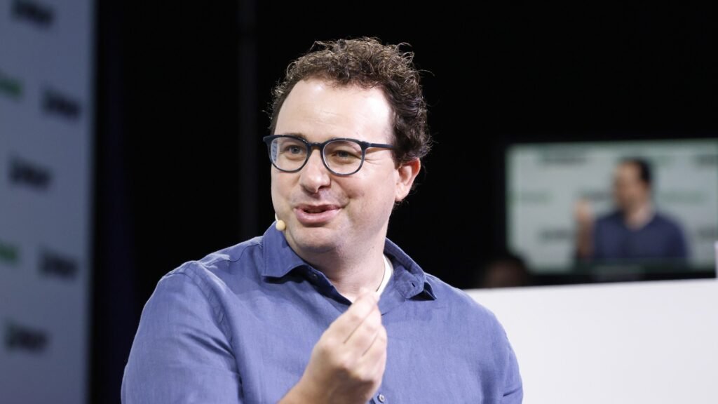 Anthropic CEO Dario Amodei speaking on stage at TechCrunch Disrupt