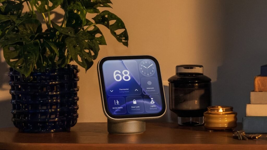 Apple HomeView smart display showing home controls on a wooden sideboard
