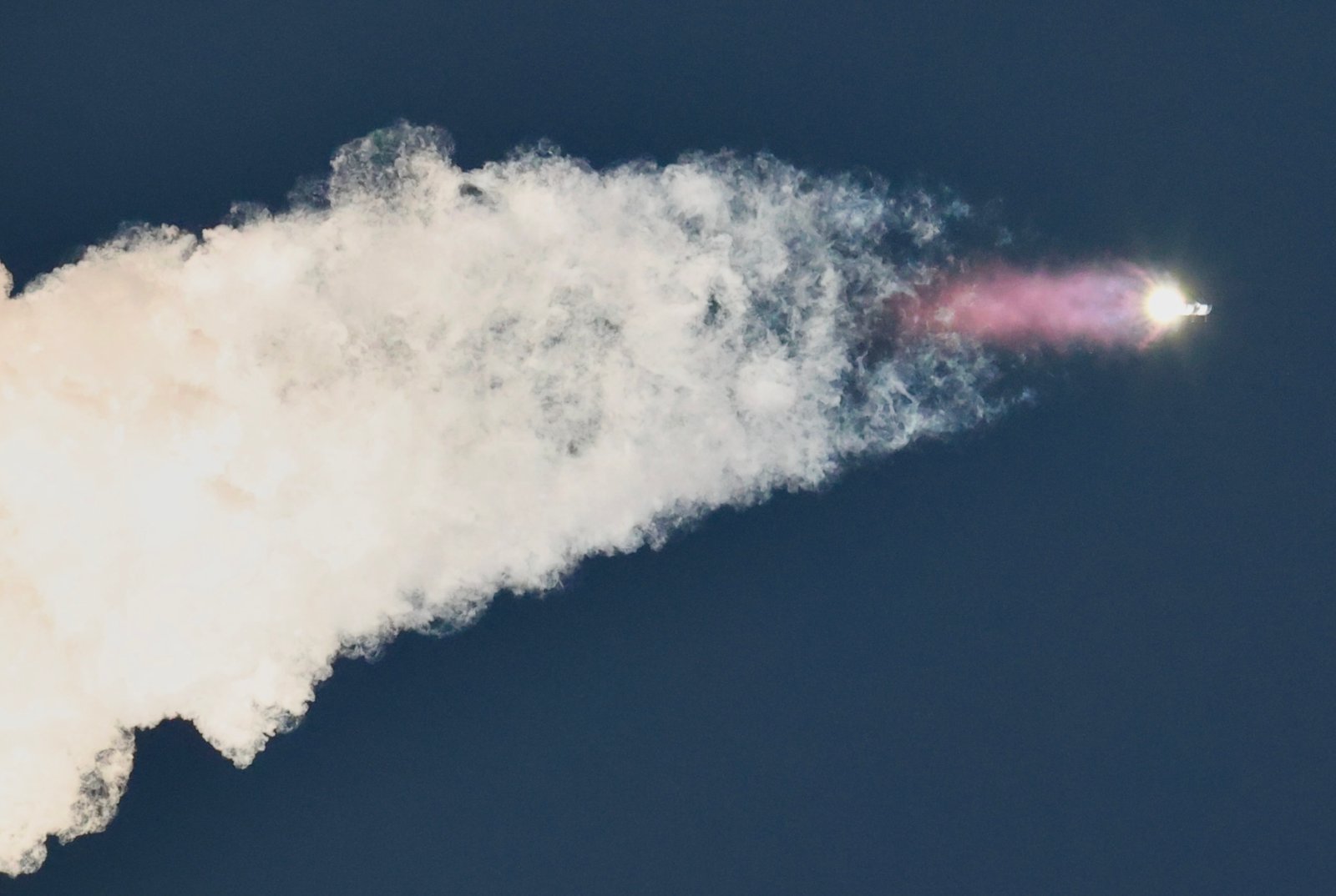 SpaceX Starship lifting off from Starbase