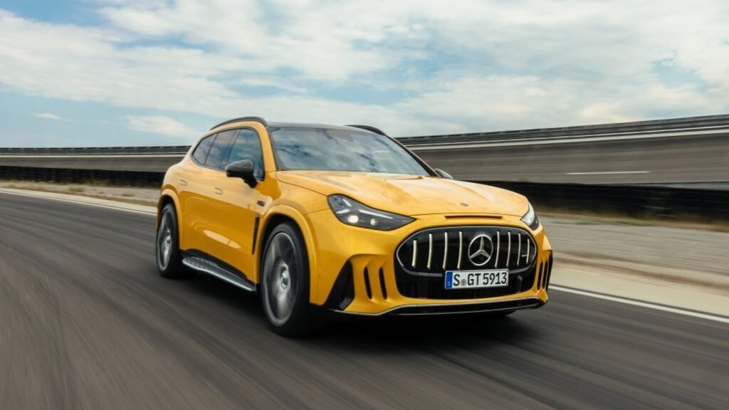 Solarbeam Yellow 2028 Mercedes-AMG GT SUV speeding on a test track