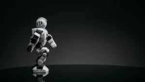 White humanoid robot walking across a dark studio floor