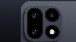 Close-up of the OnePlus 16's triple camera module on a dark background