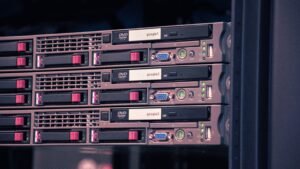Close-up of server racks labeled Google inside a data center