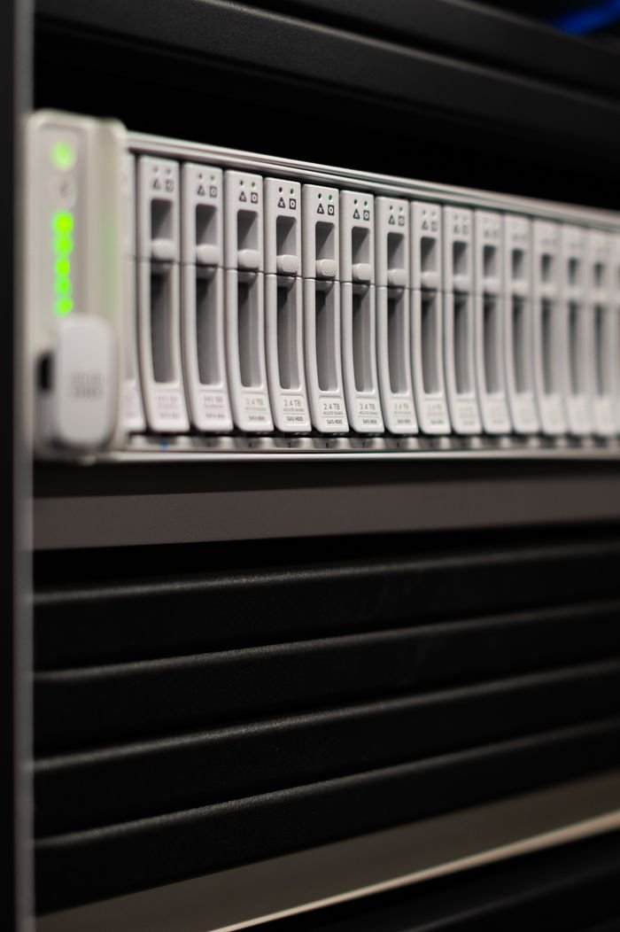 Close-up of server rack units with indicator lights in a data center